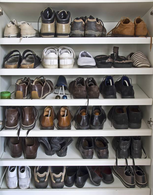 May shoes on shelves in a closet