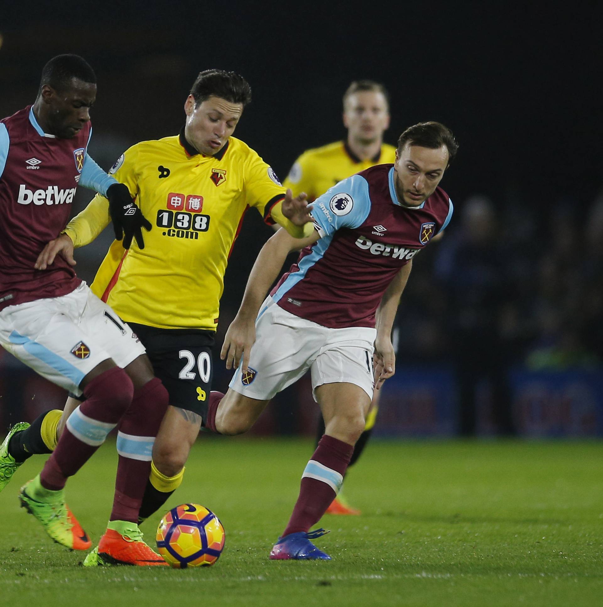 Watford's Mauro Zarate in action with West Ham United's Pedro Obiang and Mark Noble
