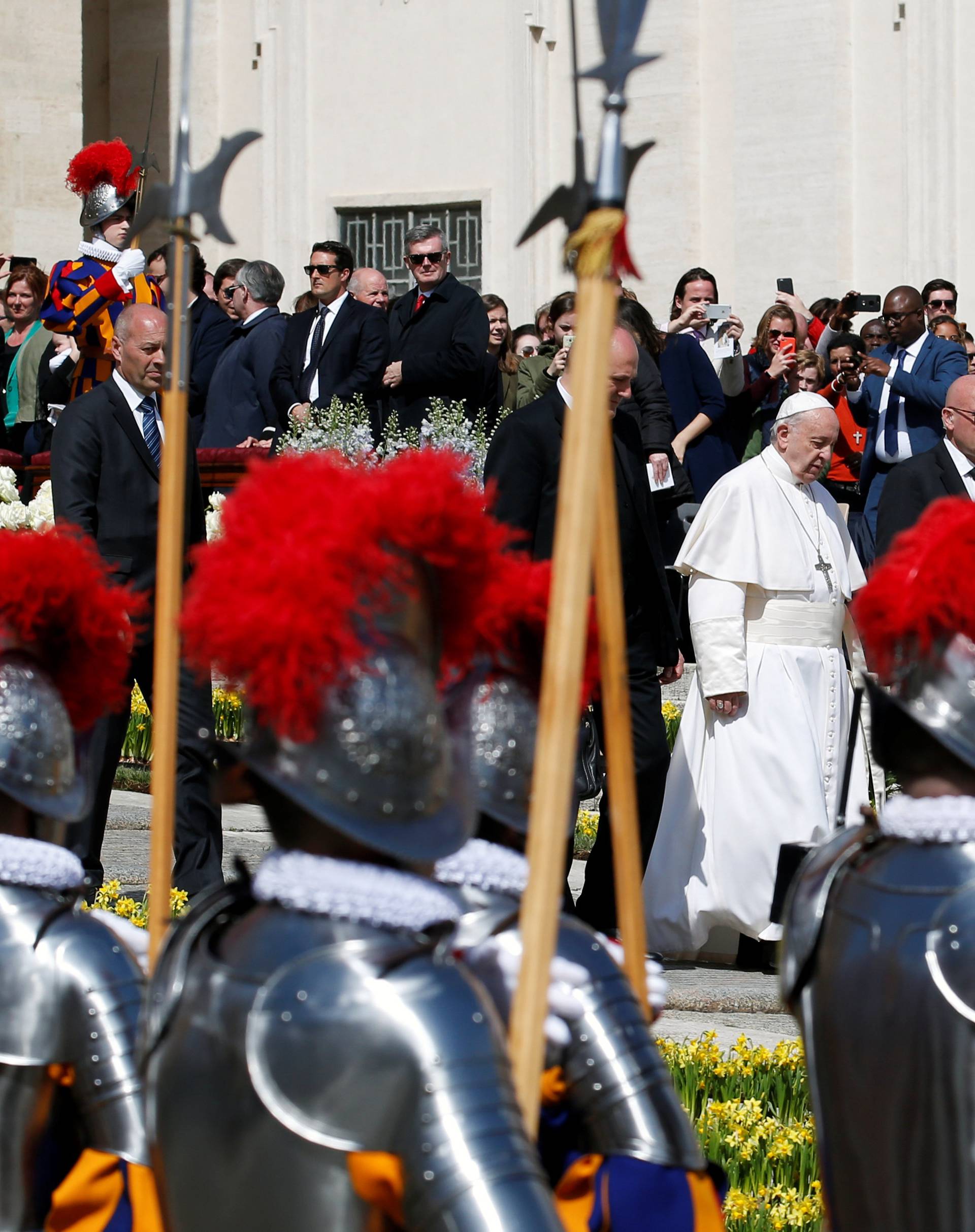Pope Francis leaves after the Easter Mass at St. Peter's Square at the Vatican
