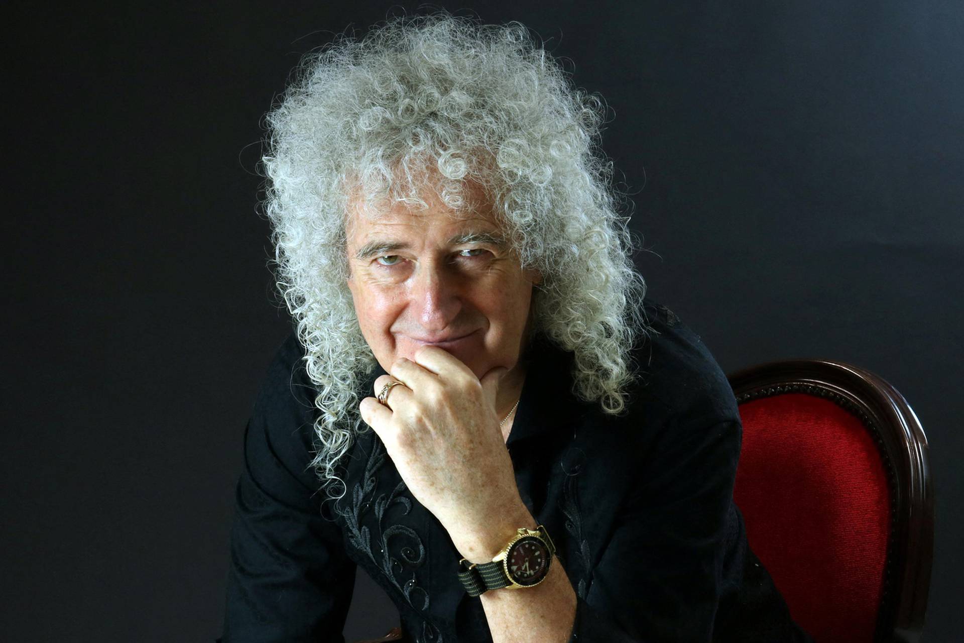 Brian May poses in this undated handout image