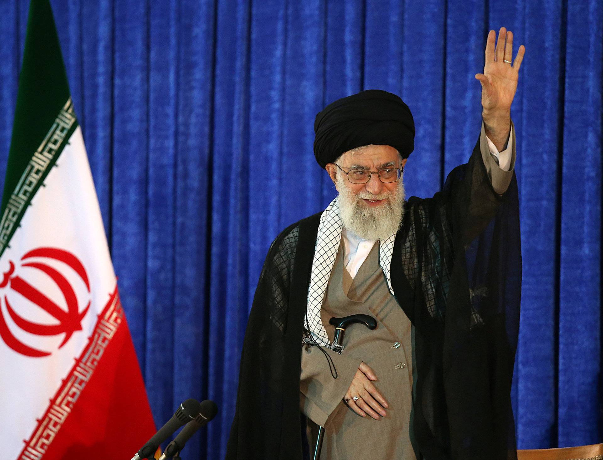 Iran's Supreme Leader Ayatollah Ali Khamenei waves as he gives a speech on Iran's late leader Khomeini's death anniversary, in Tehran