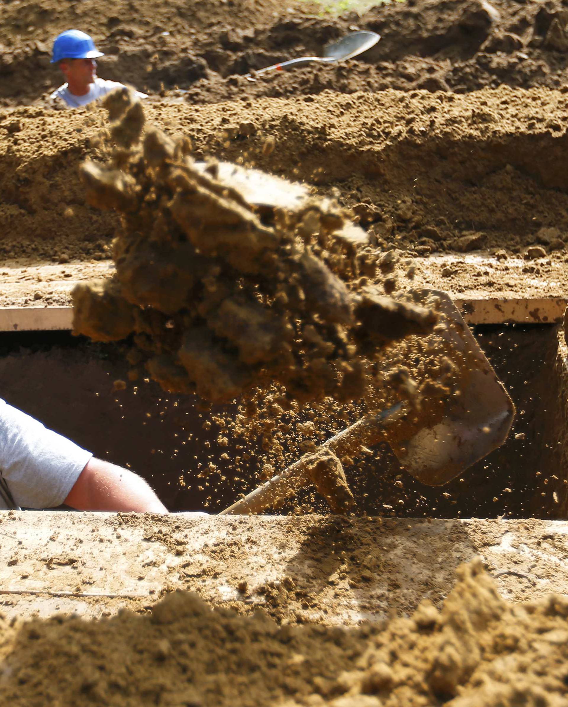 Gravedigger competes in Hungarian grave digging championship in Debrecen