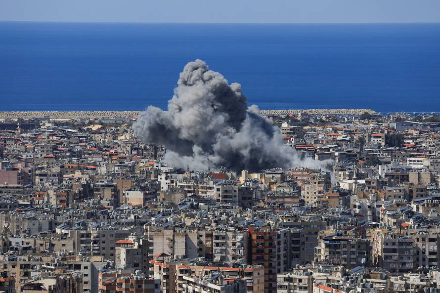 Smoke billows after an Israeli strike on Beirut's southern suburbs