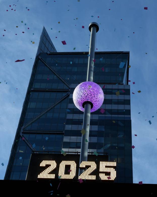 A newly created New Year's eve ball is raised for the first time above One Times Square ahead of the New Year's Eve ball drop in New York