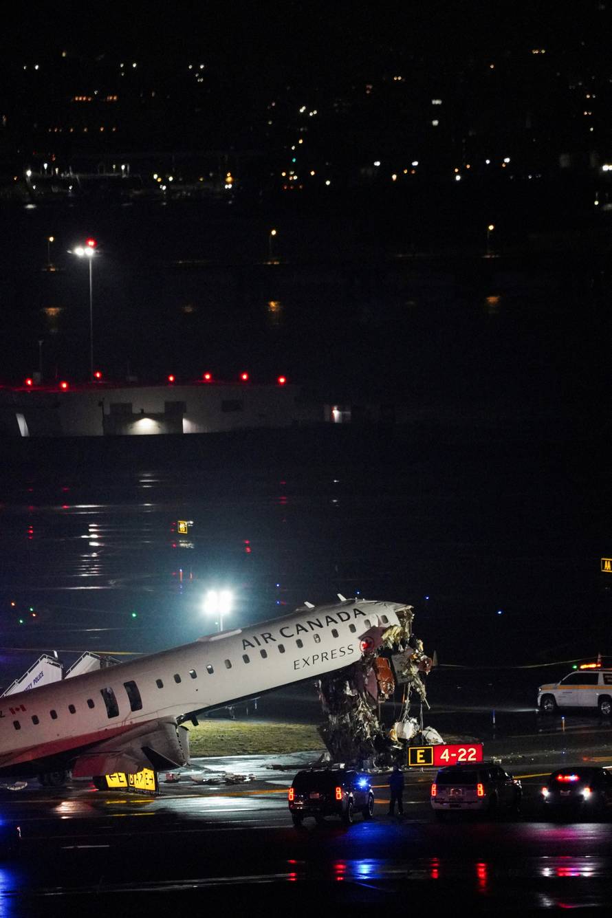 Air Canada Express jet collides with a ground vehicle at LaGuardia airport