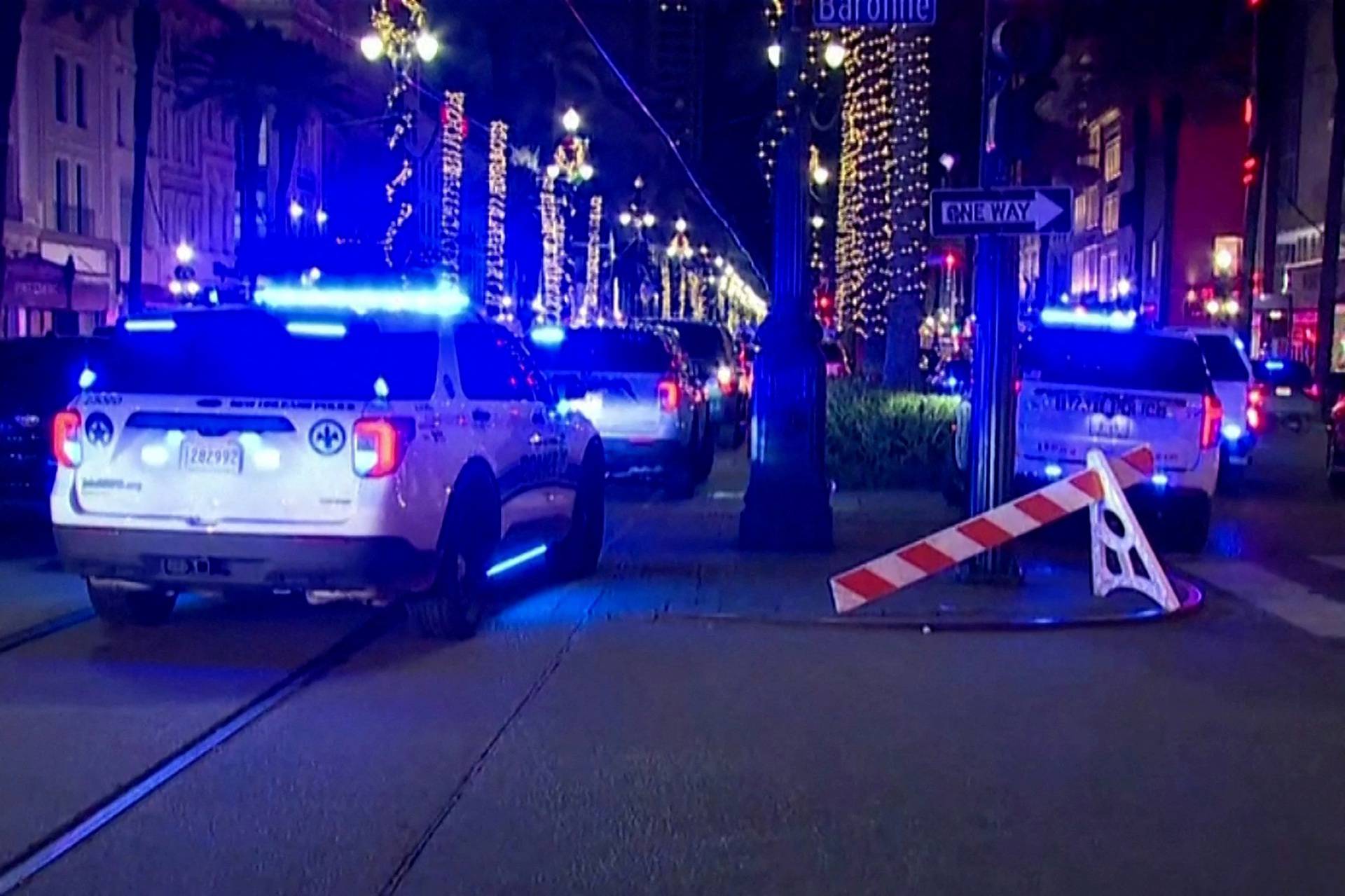 Police attend the scene where a pickup truck drove into a large crowd on Bourbon Street in New Orleans