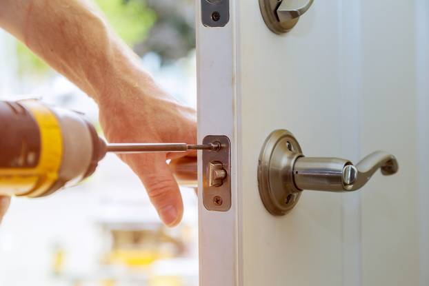 Installation,Locked,Interior,Door,Knobs,,Close-up,Woodworker,Hands,Install,Lock.