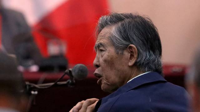 FILE PHOTO: Former President of Peru Alberto Fujimori attends a trial as a witness at the navy base in Callao