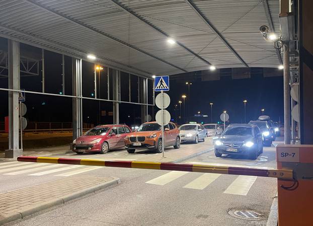 Cars are waiting at the Nuijamaa border checkpoint between Russia and Finland