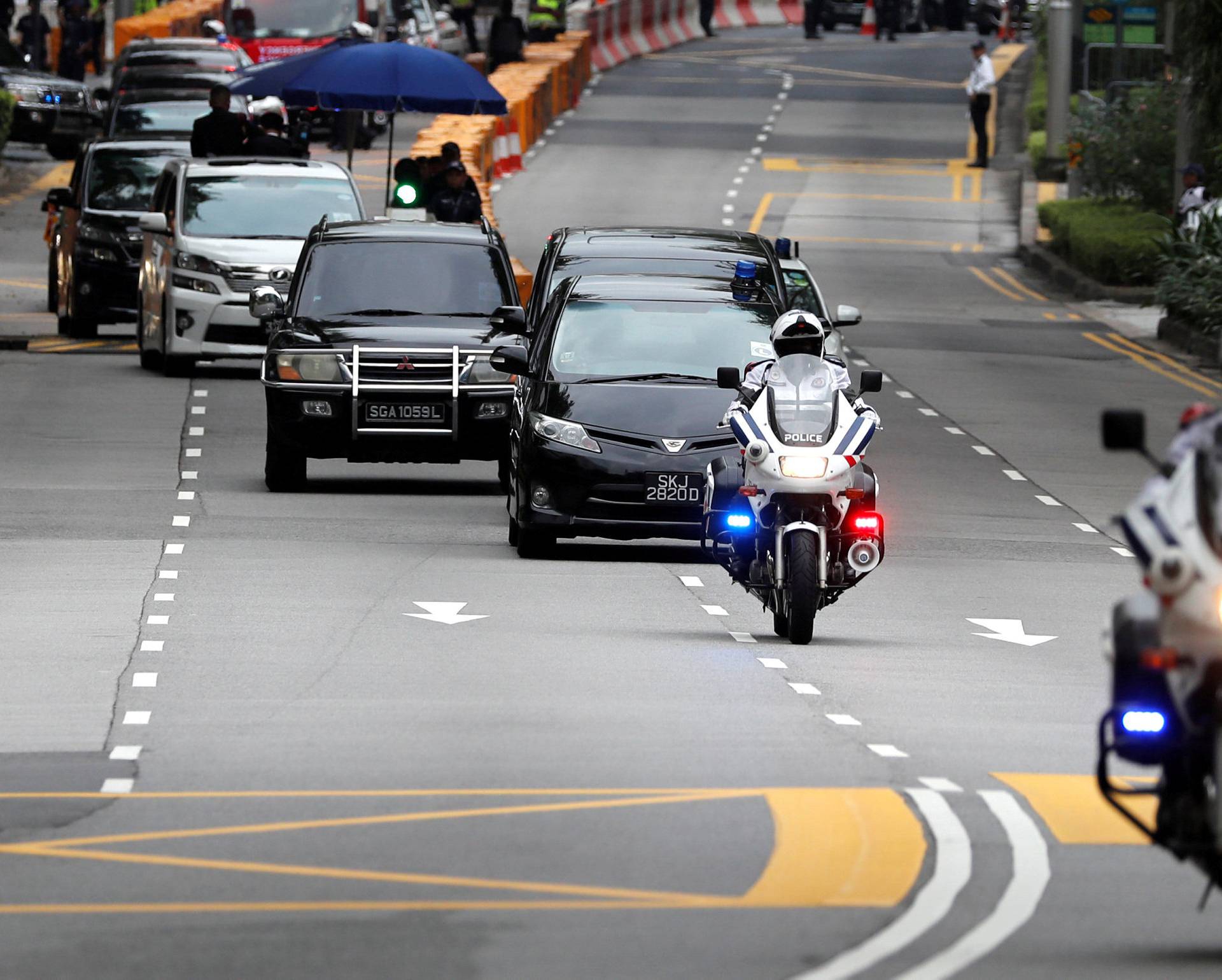 The motorcade of North Korean leader Kim Jong Un travels towards Sentosa for his meeting with U.S. President Donald Trump, in Singapore