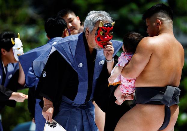 Babies take part in 'Nakizumo' or baby crying sumo contest at Sensoji temple in Tokyo