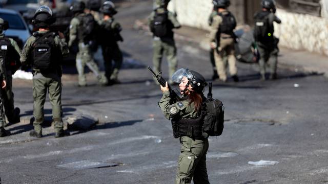 Israeli border police secure a street outside of the Old City of Jerusalem