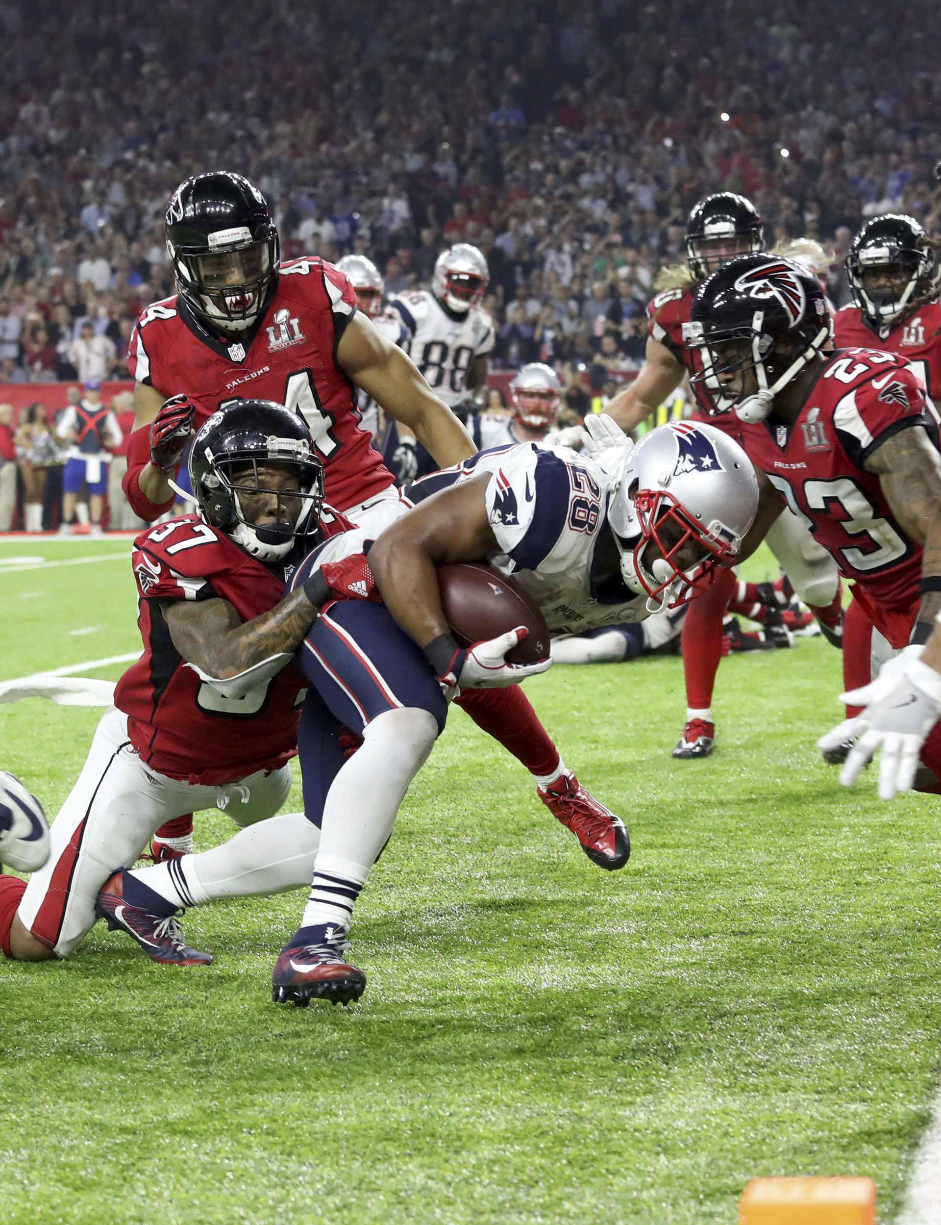 New England Patriots' James White scores a touchdown during overtime to win the Super Bowl LI against the Atlanta Falcons in Houston