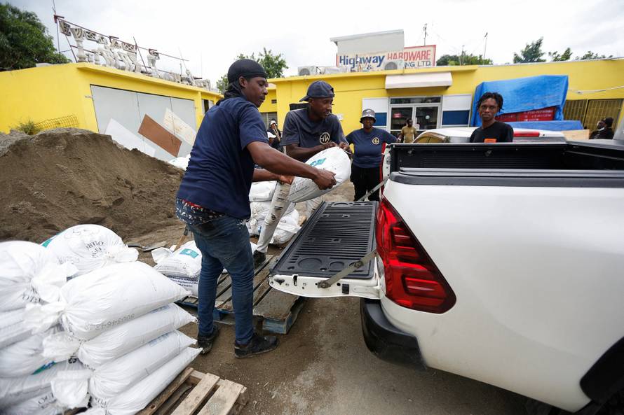 People make preparations ahead of the arrival of Hurricane Melissa, in Kingston