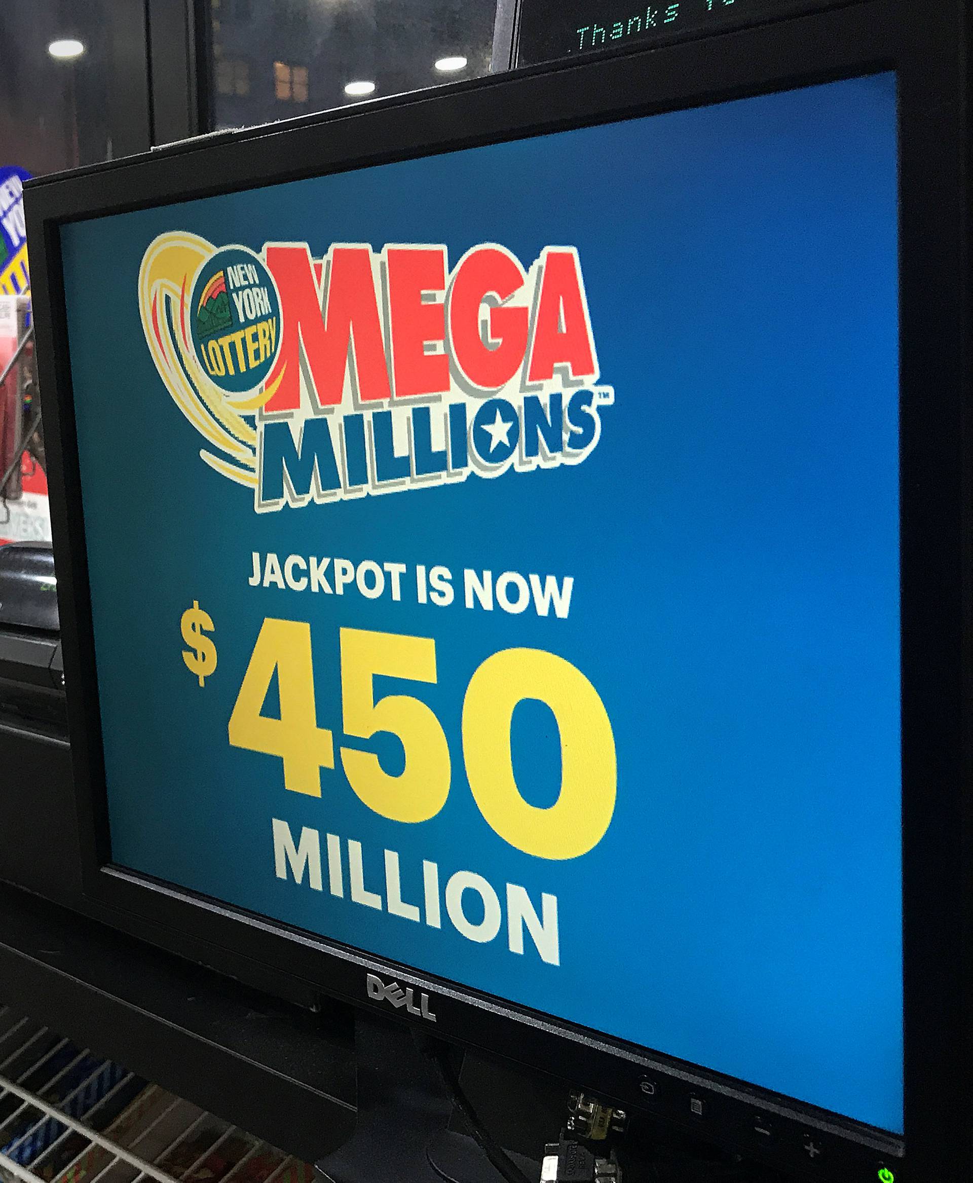 A Mega Millions sign is pictured in a store in New York City