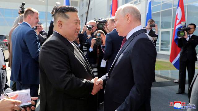 FILE PHOTO: North Korean leader Kim Jong Un meets Russia's President Vladimir Putin