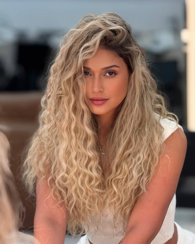 FOTO Igrač Barcelone osam je godina bio 'samo prijatelj' pa ipak osvojio atraktivnu plavušu