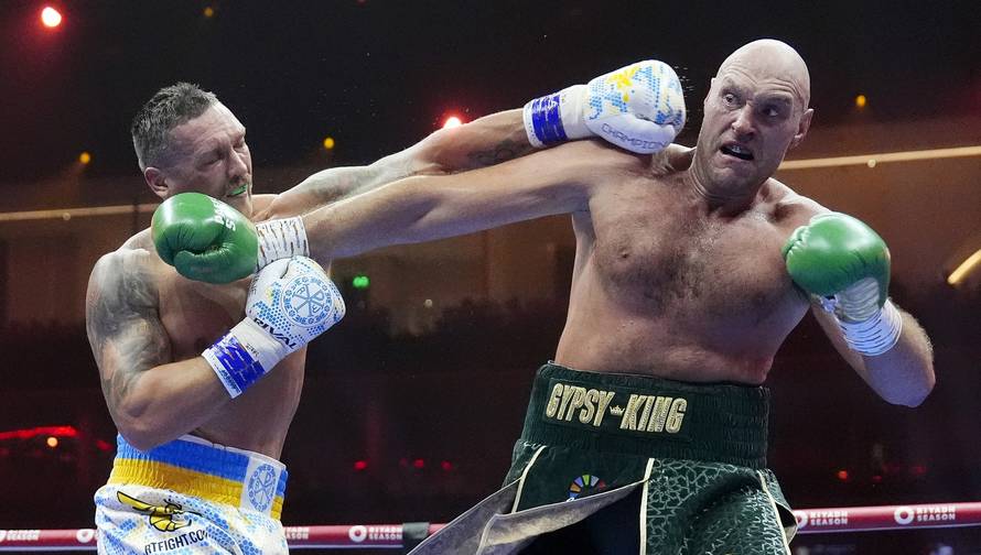 Tyson Fury and Oleksandr Usyk file photo