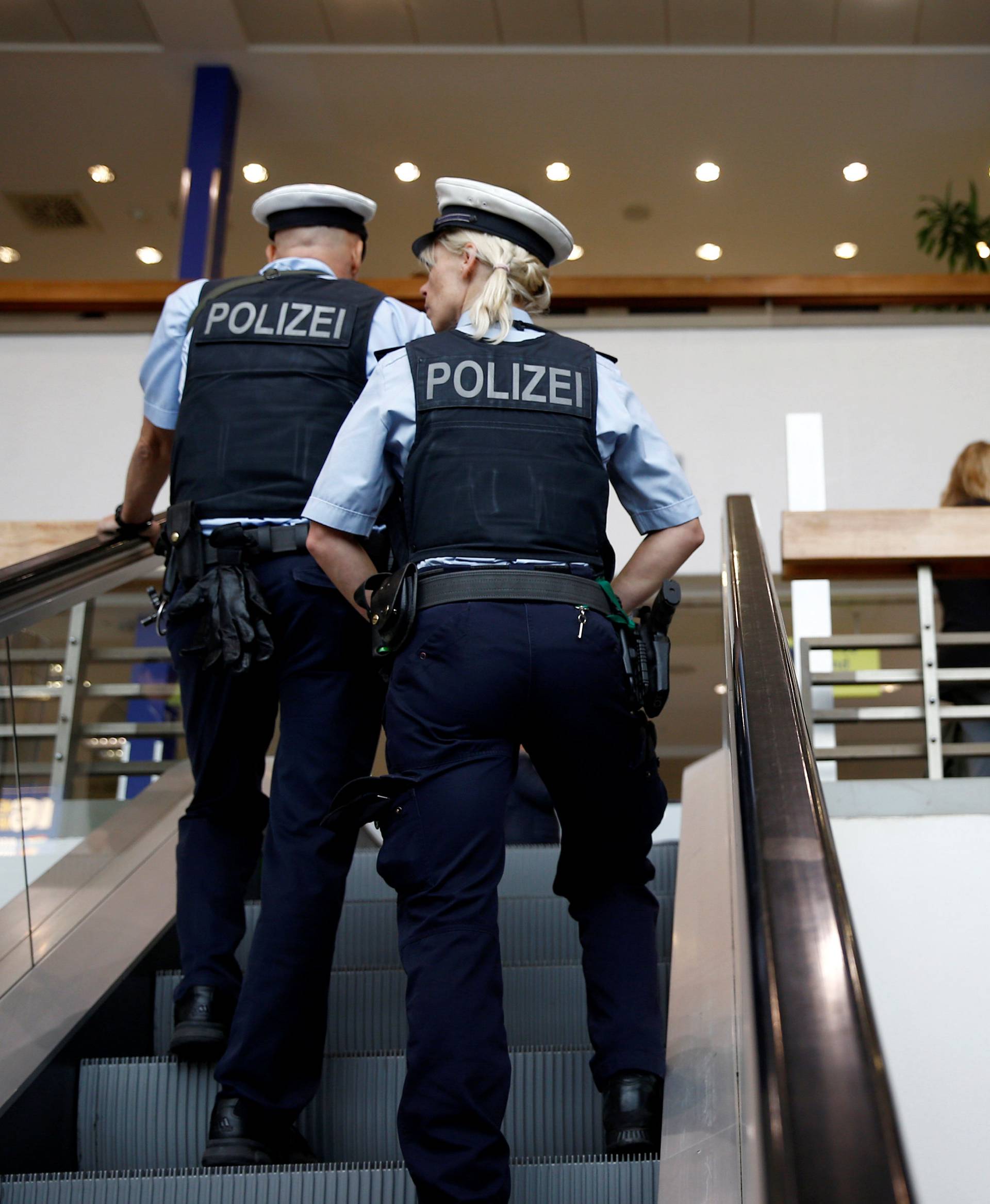 German policemen guards main terminal of Berlin-Schoenefeld airport in Schoenefeld