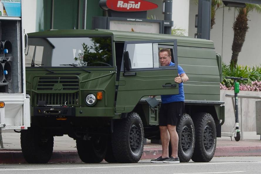 EXCLUSIVE: Arnold Schwarzenegger and Heather Milligan Run Errands in his New Military Truck.