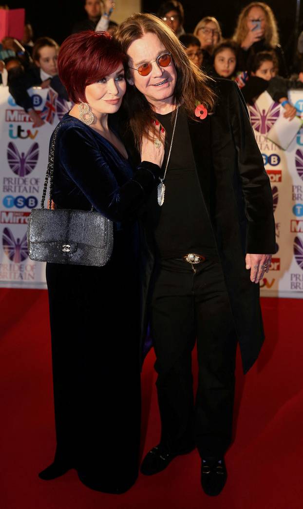 FILE PHOTO: Singer Ozzy Osbourne arrives with his wife Sharon for the Pride of Britain Awards in London