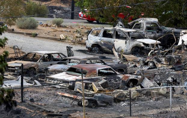 Charred vehicles from the Hawk Fire in Reno