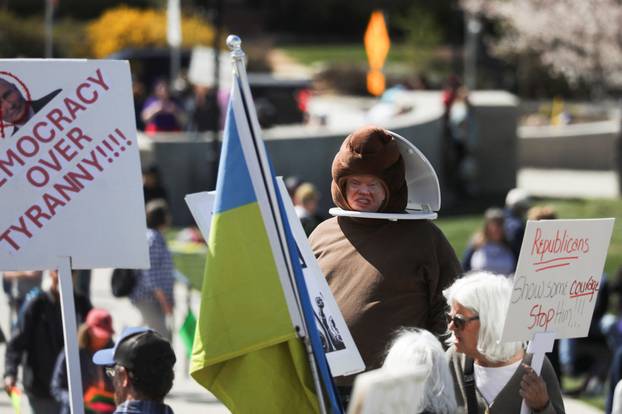 People participate in a protest, in a demonstration that is part of larger "Hands off" events organized nationwide against U.S. President Trump, in Salt Lake City