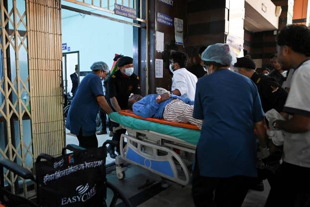 Nandu Ghale Gharti is rushed to the trauma centre of Bir Hospital in Kathmandu
