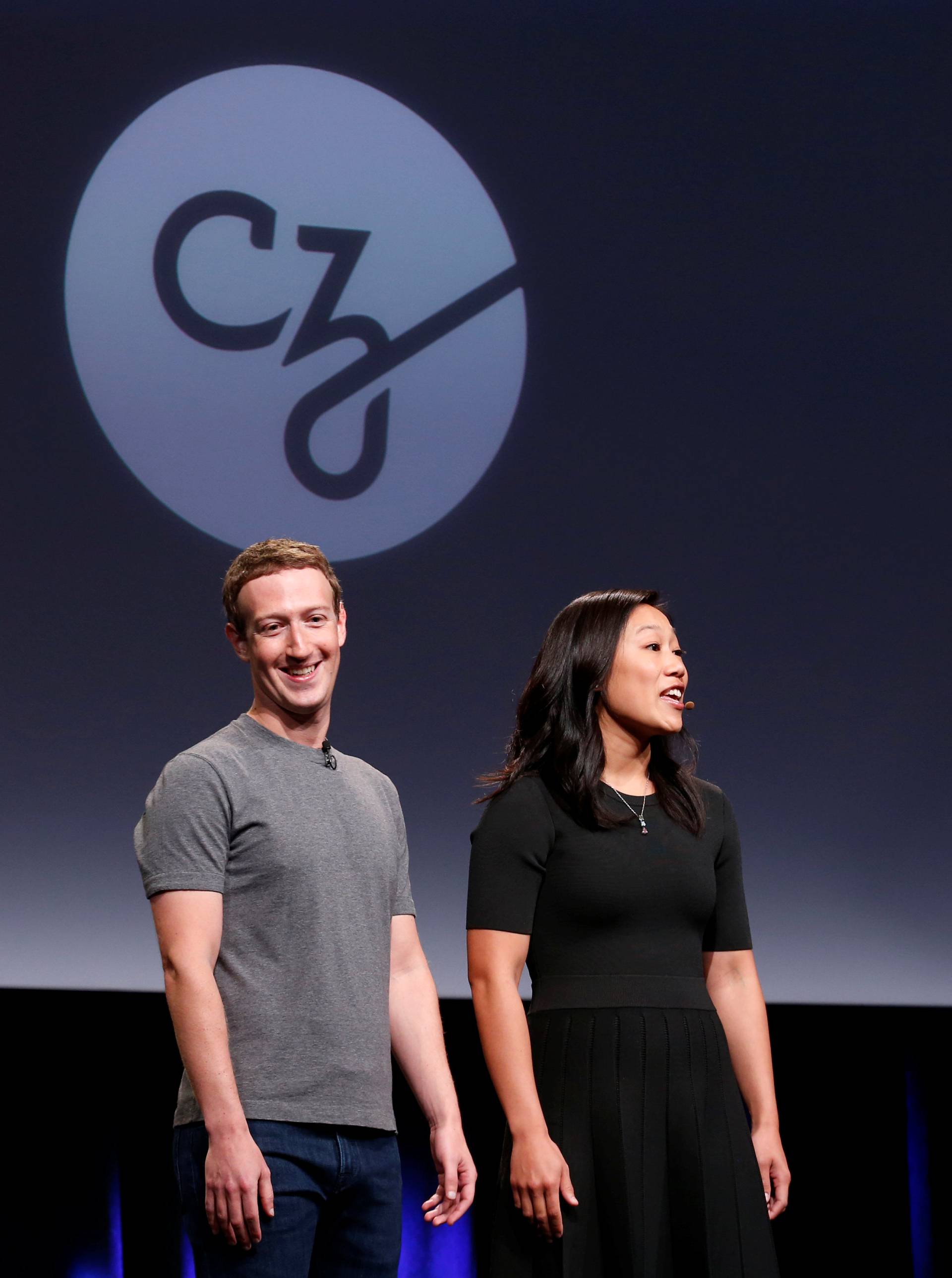 Priscilla Chan and her husband Mark Zuckerberg announce the Chan Zuckerberg Initiative to cure all diseases by the end of the century during a news conference at UCSF Mission Bay in San Francisco, California