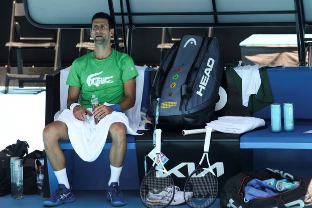 Serbian tennis player Novak Djokovic rests at Melbourne Park as questions remain over the legal battle regarding his visa to play in the Australian Open