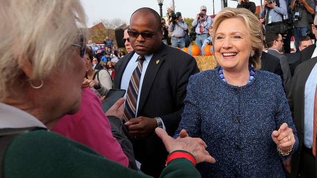 U.S. Democratic presidential nominee Hillary Clinton greets audience members at a campaign rally in Cedar Rapids