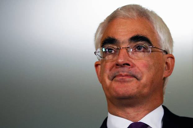 FILE PHOTO: Britain's Chancellor Alistair Darling listens during a news conference in London