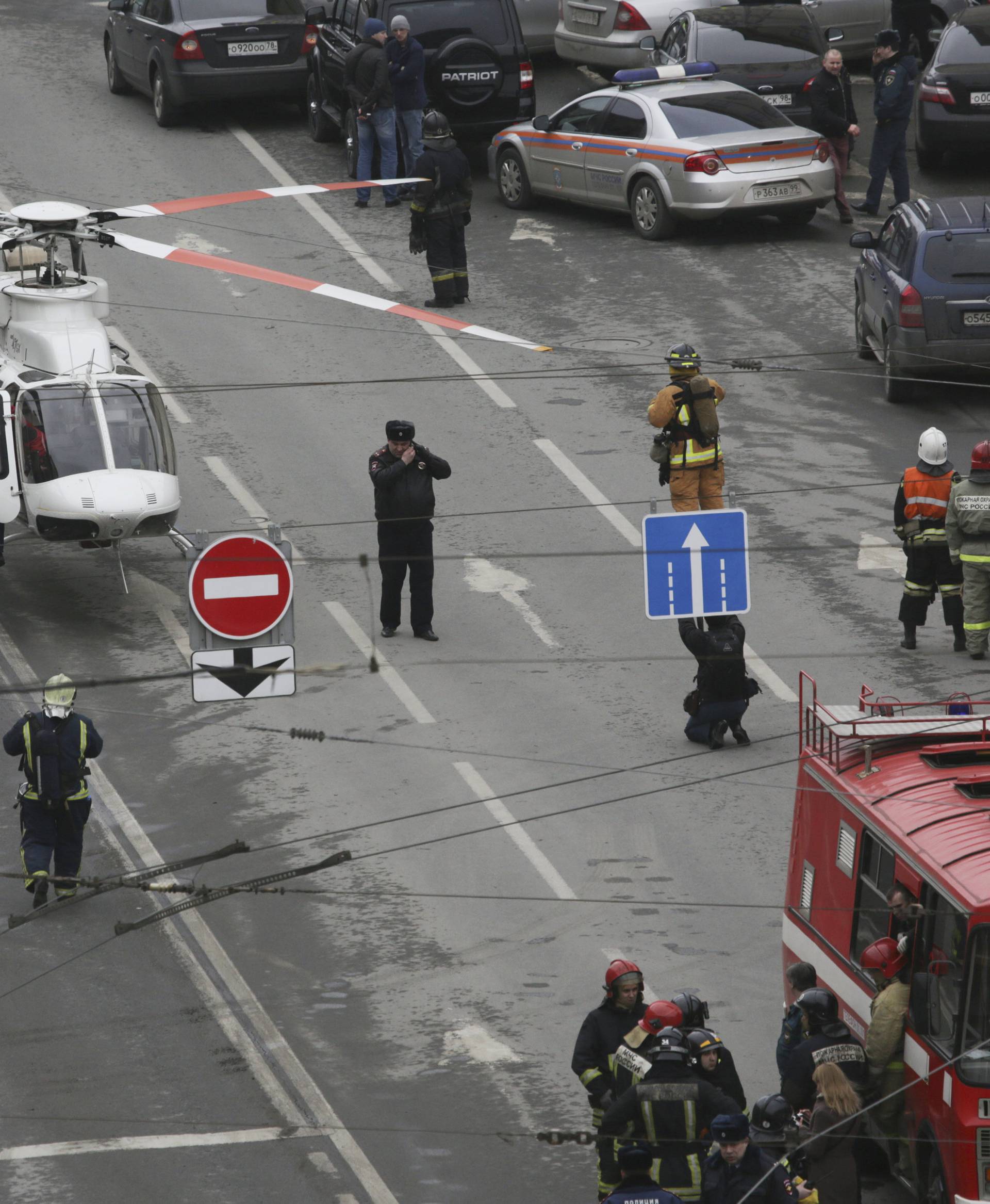 General view of emergency services attending the scene outside Sennaya Ploshchad metro station, following explosions in two train carriages in St. Petersburg