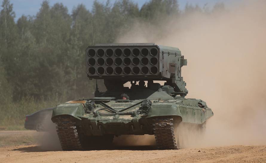 A Russian TOS-1A Solntsepek multiple rocket launcher drives during the annual international military-technical forum "ARMY" in Alabino