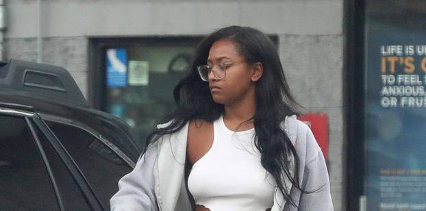 *EXCLUSIVE* Sasha Obama remains upbeat during casual outing as she is seen wearing a medical brace on her hand. - ** WEB MUST CALL FOR PRICING **