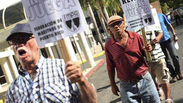 Members of the Committee of retired Teachers of Puerto Rico's Teachers Federation protest in San Juan