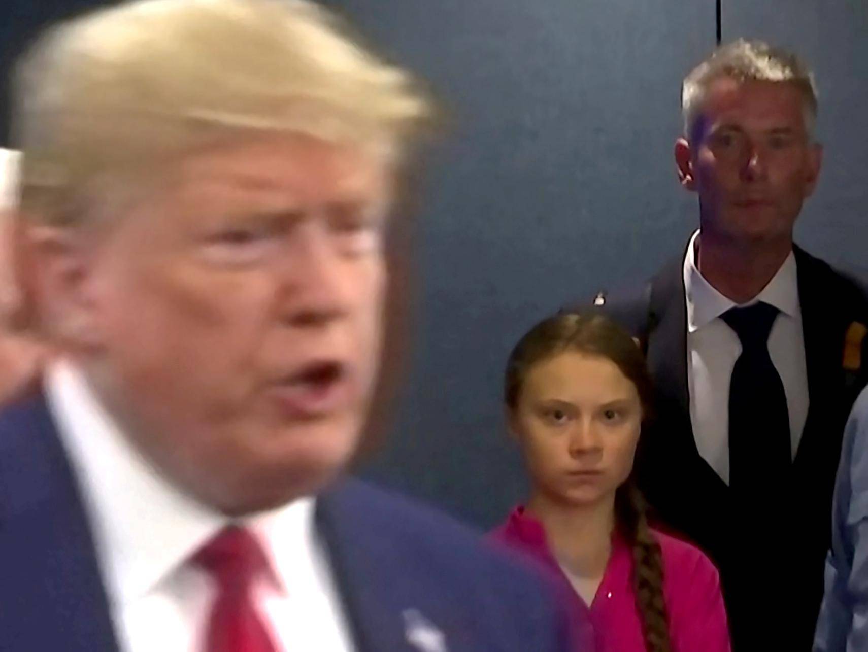 Swedish environmental activist Greta Thunberg watches as U.S. President Donald Trump enters the United Nations