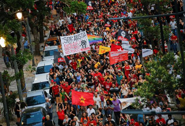 Pro-democracy demonstrators march in Porto Alegre