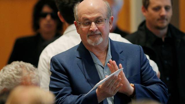 FILE PHOTO: Author Salman Rushdie arrives for the PEN New England's Song Lyrics of Literary Excellence Award ceremony at the John F. Kennedy Library in Boston