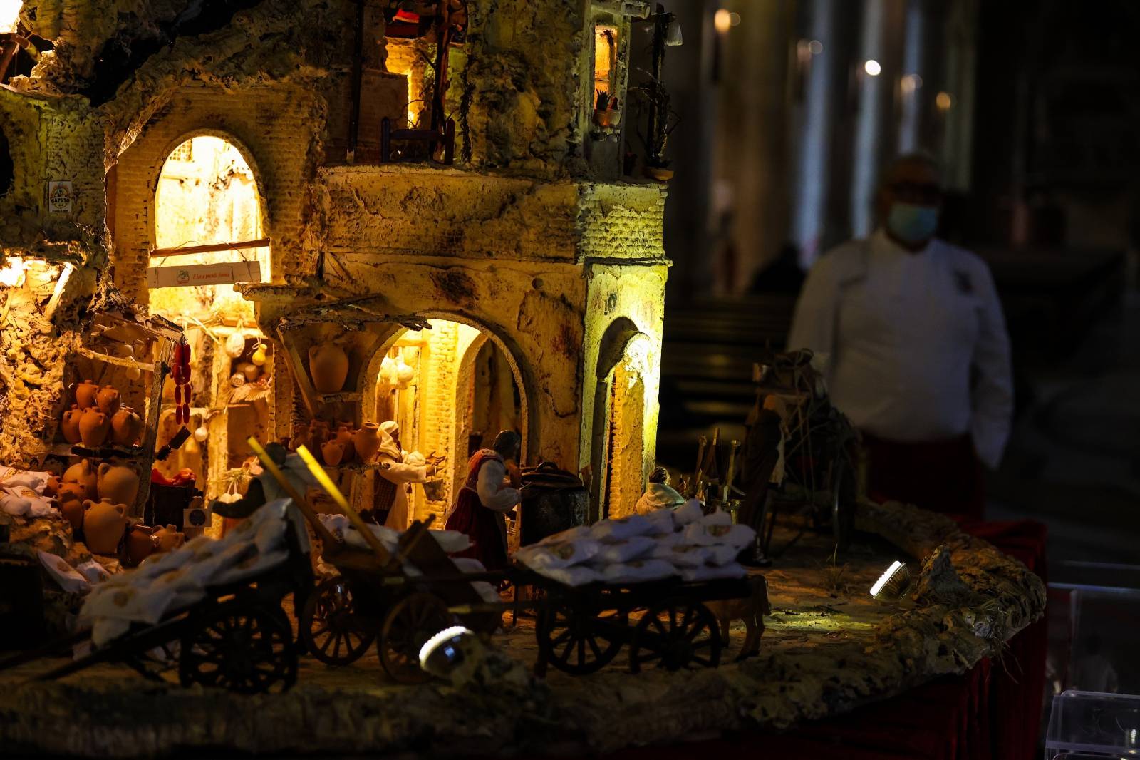 A large nativity scene whose base is also made of pizza to celebrate Christmas in the Basilica of Santa Chiara