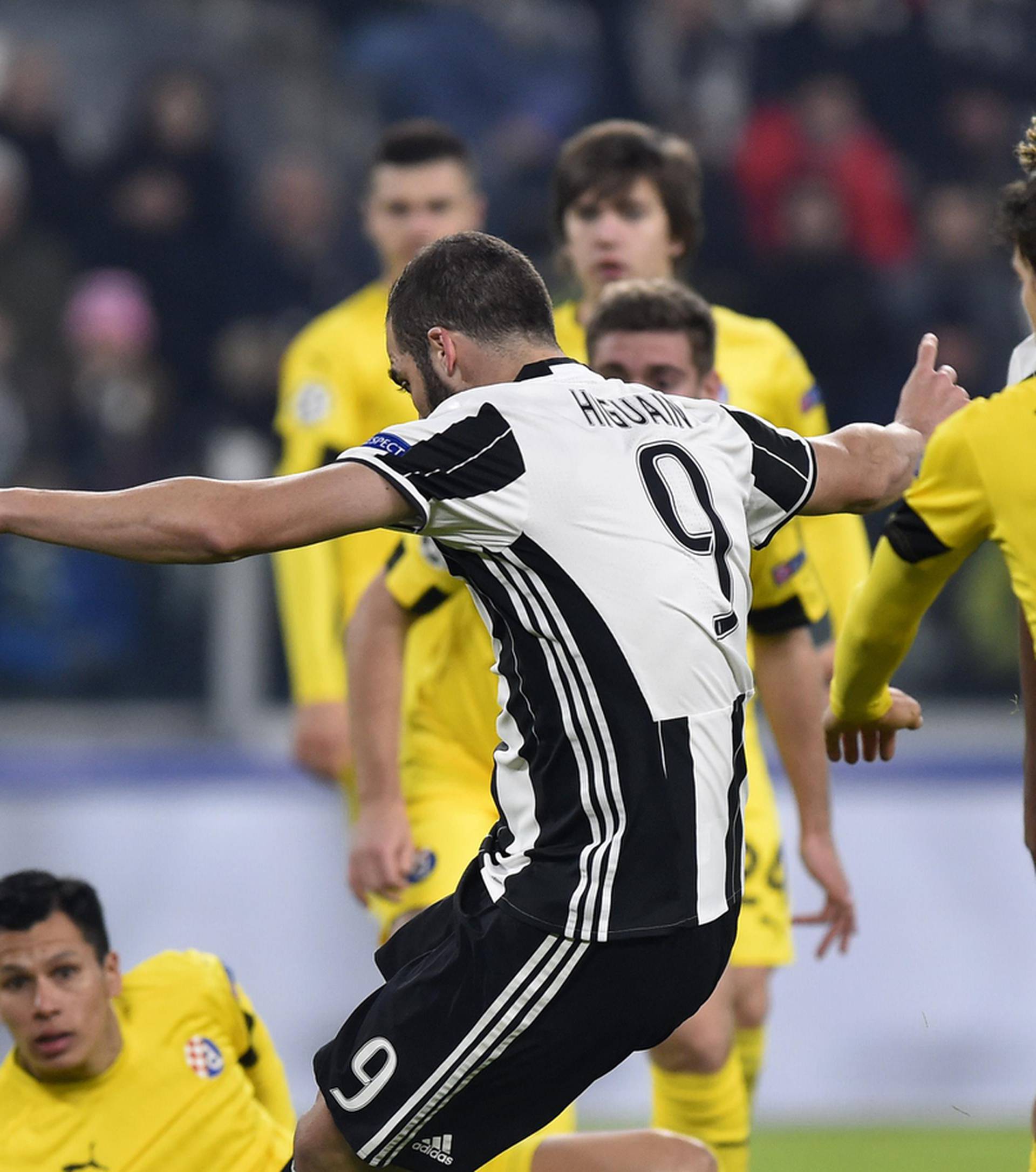 Juventus' Gonzalo Higuain scores their first goal