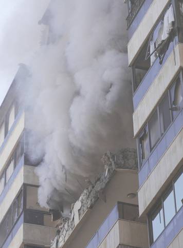 Smoke rises from a building following an Israeli air strike in Beirut