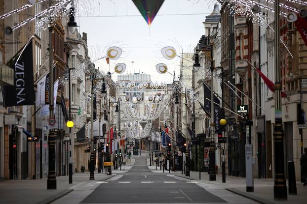 A view of a quiet New Bond Street as shops remain closed under Tier 4 restrictions, amid the coronavirus disease (COVID-19) outbreak, in London