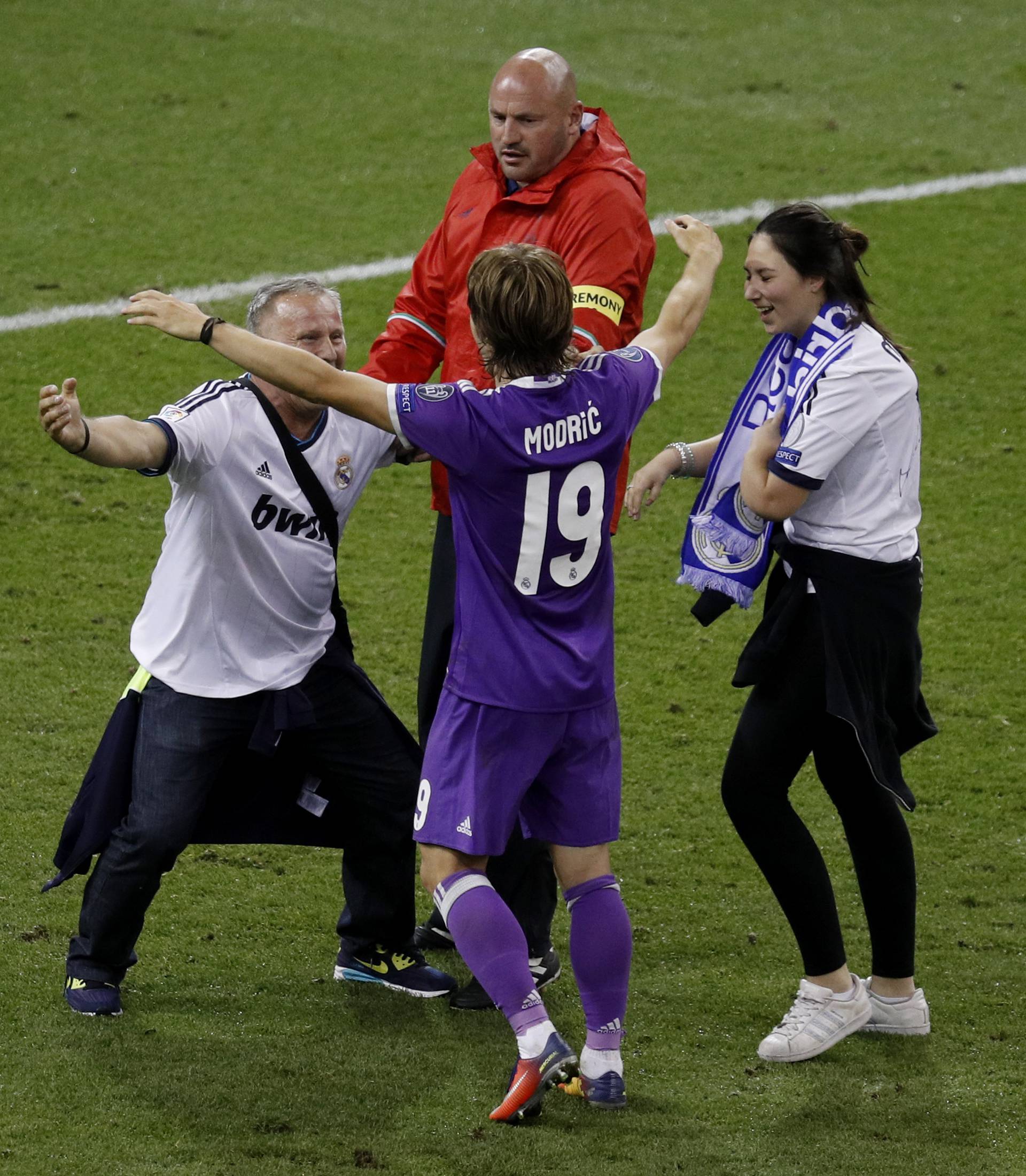 Real Madrid's Luka Modric celebrates with family after winning the UEFA Champions League Final