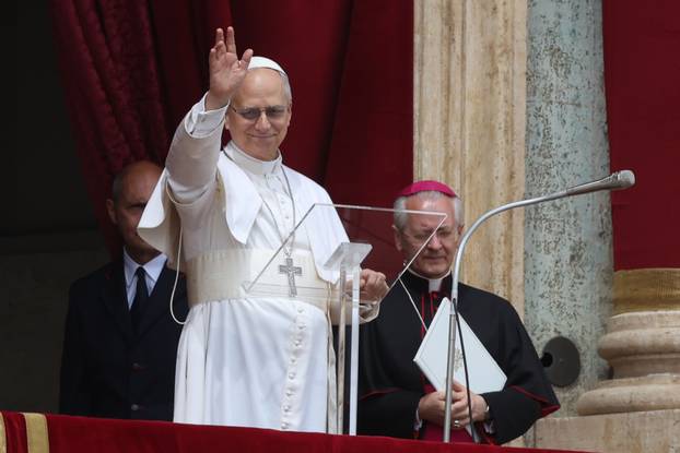 Pope Leo XIV recites the Regina Coeli prayer from the central loggia of St. Peter's Basilica