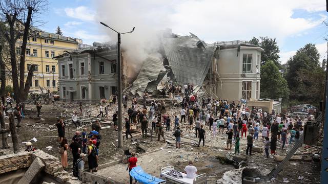 Rescuers work at Ohmatdyt Children's Hospital that was damaged during a Russian missile strikes, in Kyiv