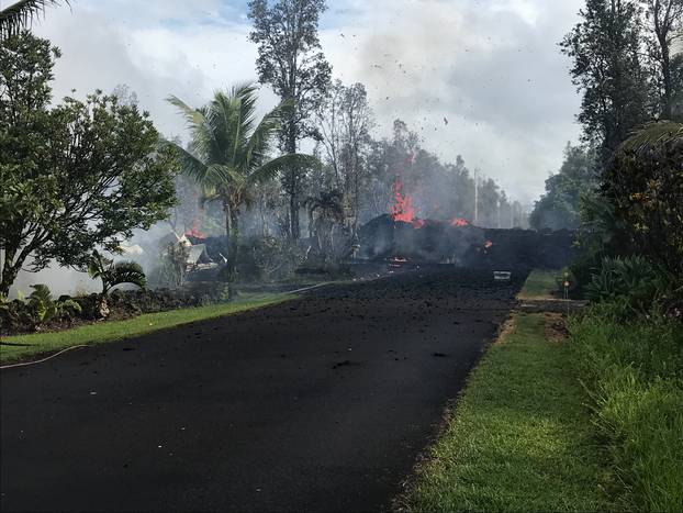 A fissure on Leilani and Kaupili Streets in the Leilani Estates subdivision caused by an eruption of the Kilauea Volcano following a series of earthquakes, in Hawaii