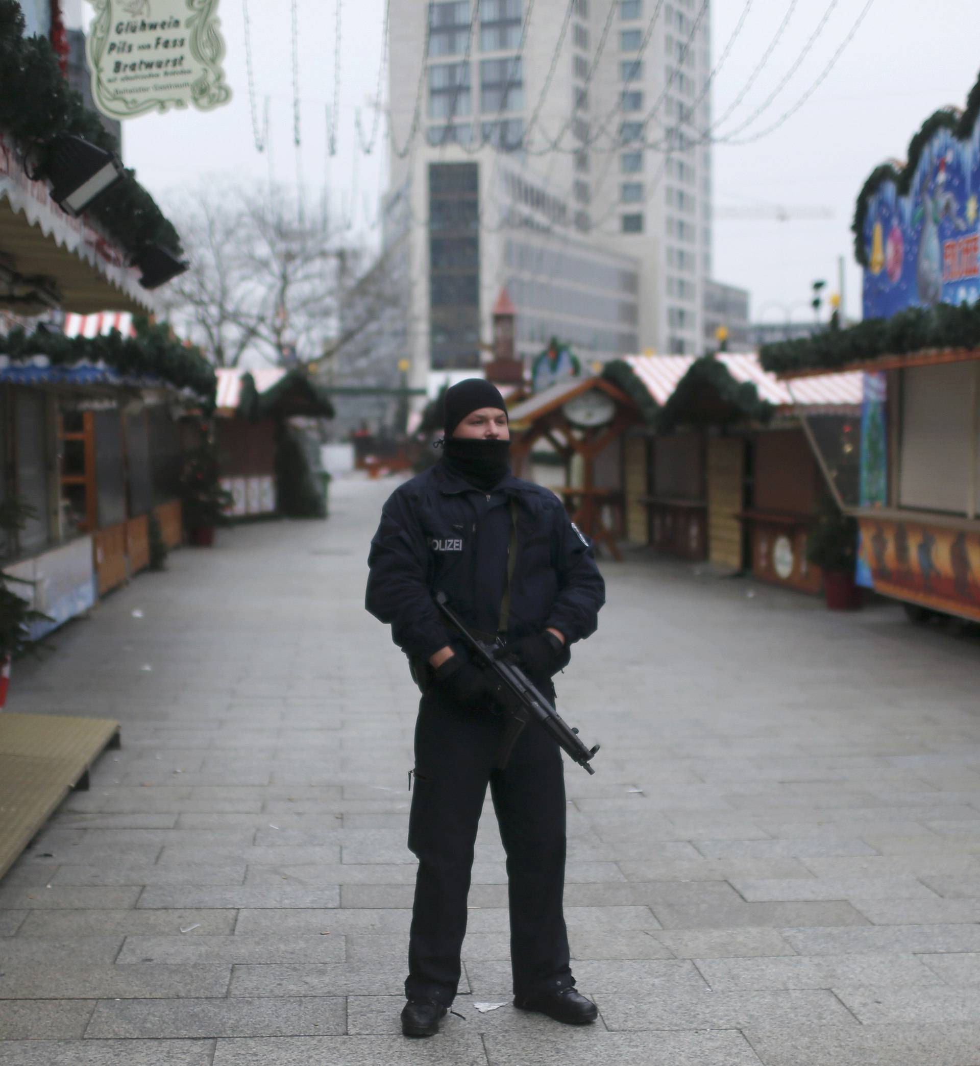 Police stands guard at the Kaiser-Wilhelm-Gedaechtniskirche Christmas market in Berlin