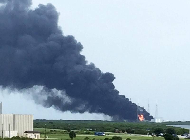 An explosion on the launch site of a SpaceX Falcon 9 rocket is shown in Cape Canaveral