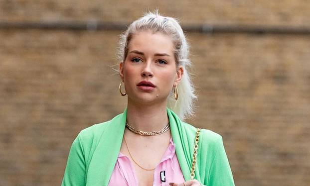 Lottie Moss looks chic and stylish in a PrettyLittleThing Green suit and a sheer pink shirt from the brand. *PICTURES TAKEN ON THE 13/09/21*